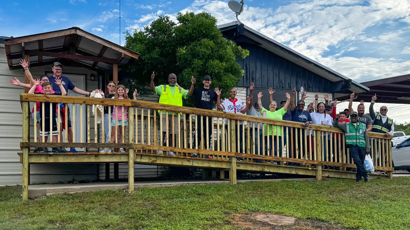 Veteran-led crew building an ADA wheelchair ramp in San Antonio, Texas